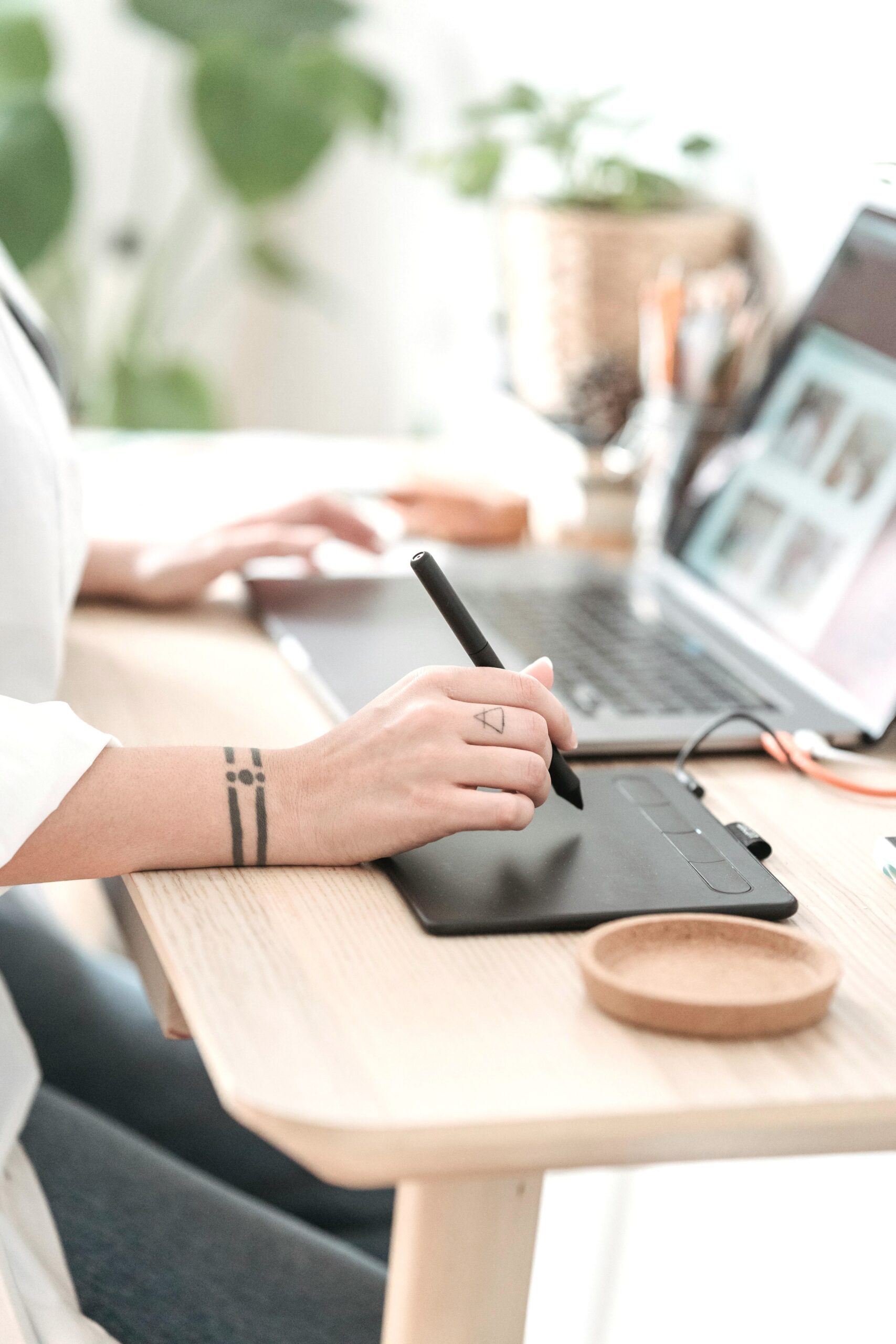 A woman sits at a desk doing work on her laptop. This article covers why fiber is becoming the preferred internet choice for modern families.
