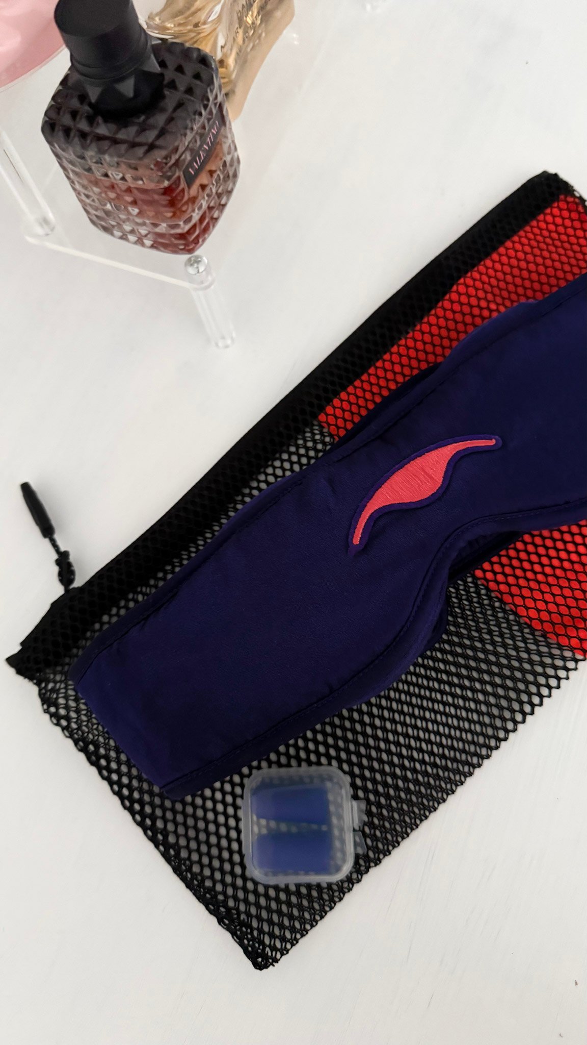 A Manta Silk Sleep Mask with earplgus, and travel/wash bag.