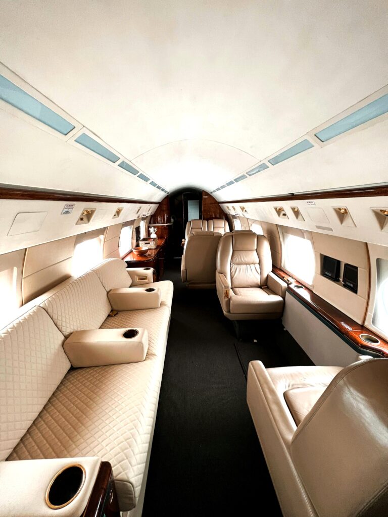 The interior of a private jet. This article covers private jet trends. It reflects on personalized luxury for the modern traveler.