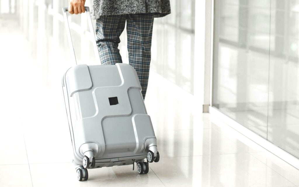 Man walking through airport.