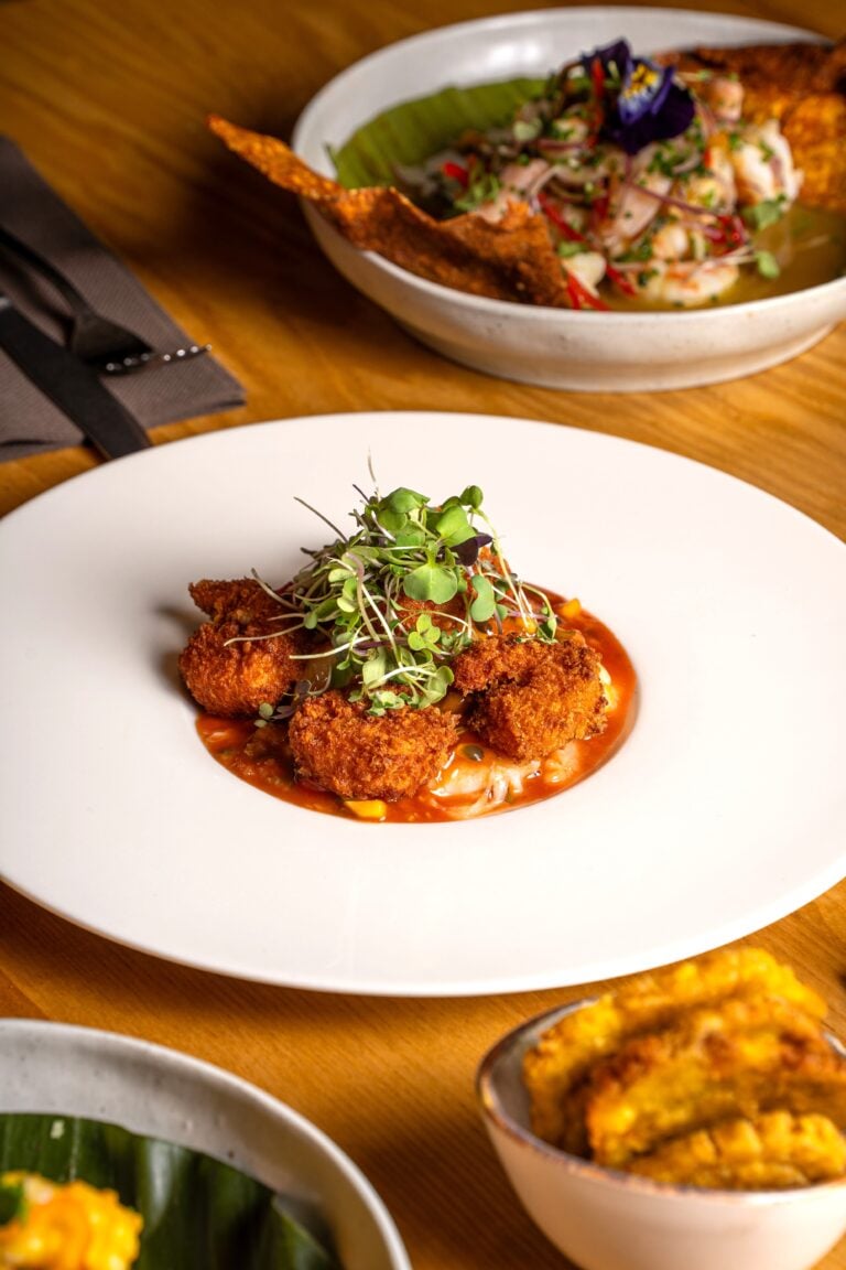 A close up of fusion dishes on a table. This article highlights Houston's most unique dining experiences.