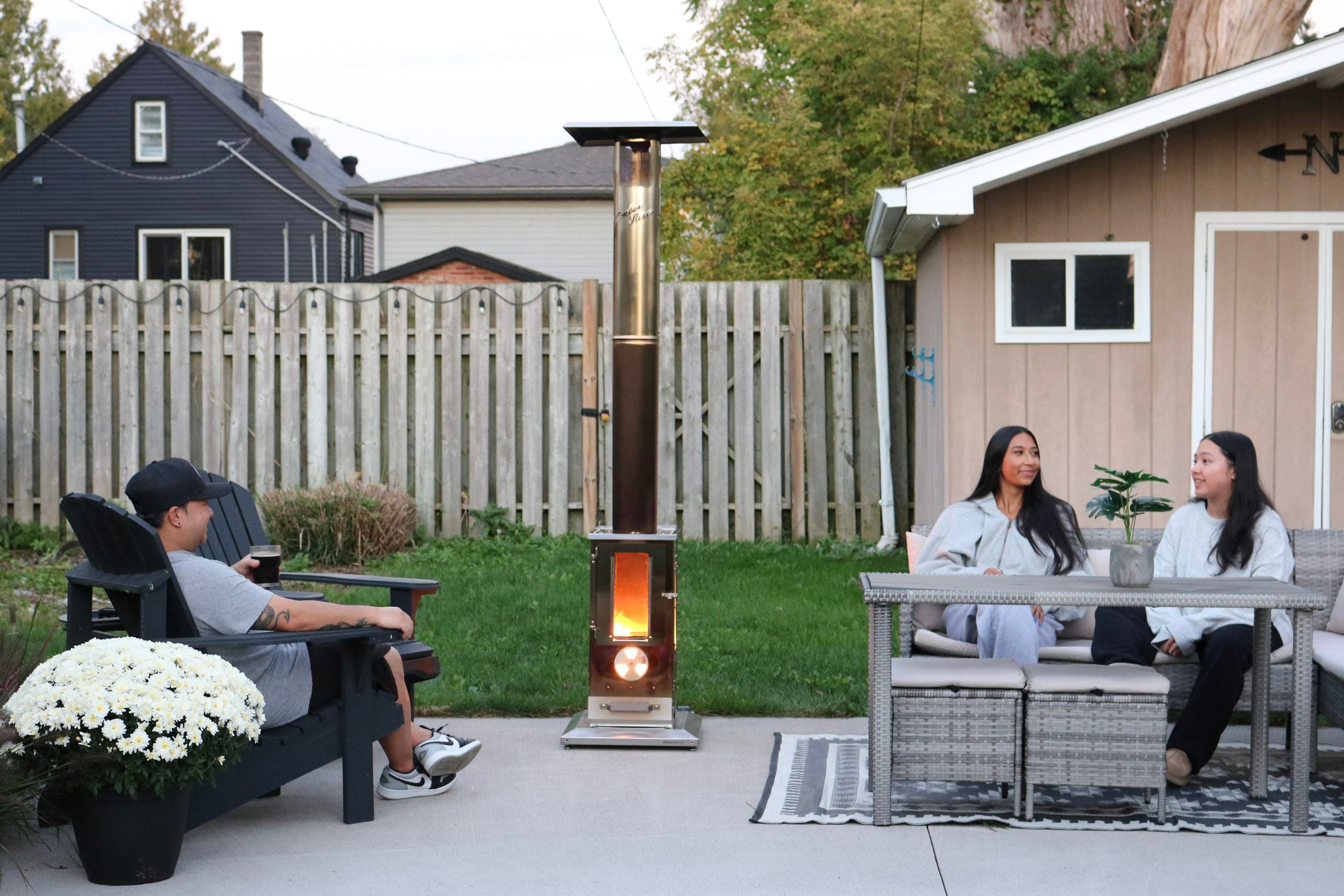 Darasak, Gabby, and Mimi are enjoying the Big Timber on the patio.